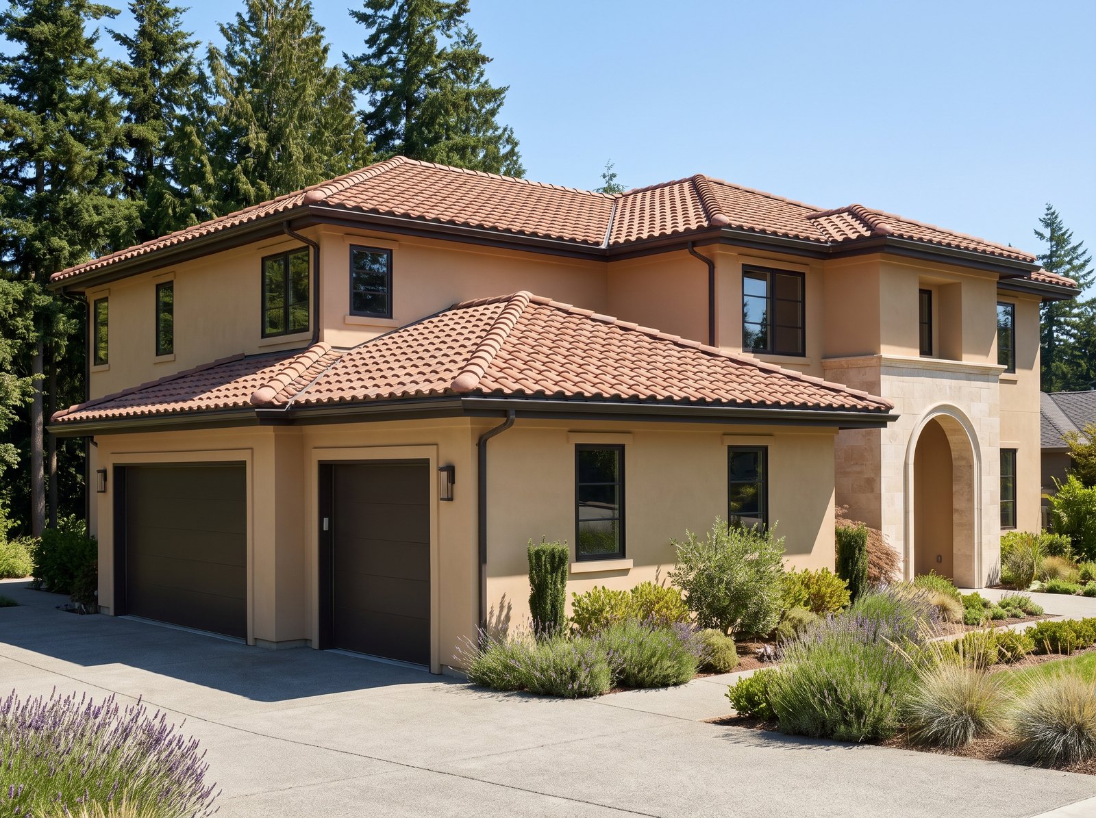 Terracotta concrete barrel tile roof on a sand stucco Greater Seattle home, seen from the driveway